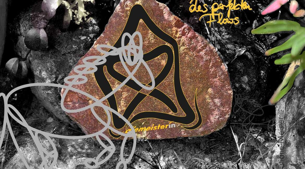 Abstract graffiti on a rock in dirt, with black and yellow curves and gray looping scribbles over a natural background.