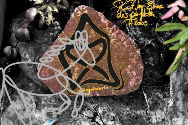 Abstract graffiti on a rock in dirt, with black and yellow curves and gray looping scribbles over a natural background.